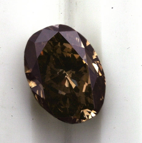 A nice brown oval cut diamond, weighing approx 5 ct