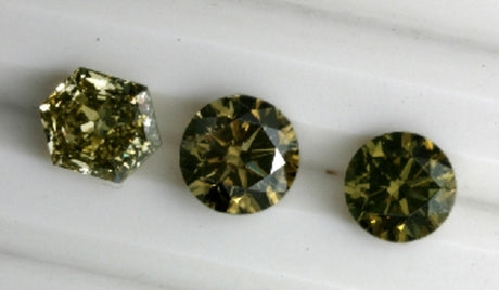 Three nice deep green diamonds