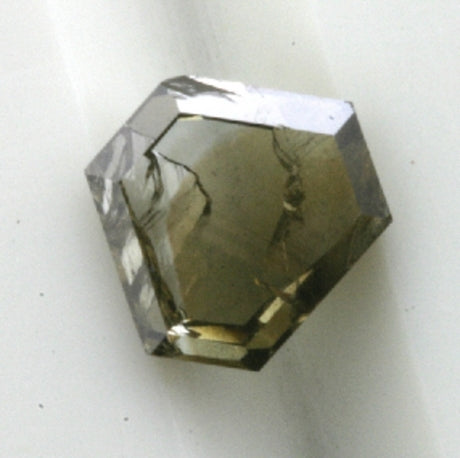 A bishop head shape diamond, very special colour and shape