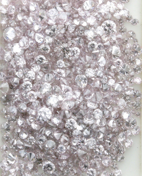 a parcel of small light pink diamonds